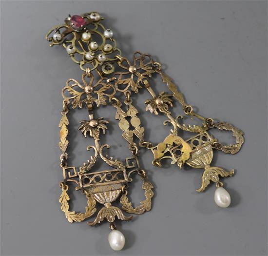 A pair of antique rose gold and pearl drop earrings of openwork form with classical motifs, converted as a brooch